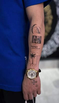 a person with a wrist tattoo that has pictures on it and palm trees in the background