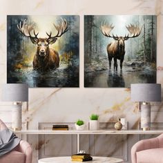 two paintings of moose in the woods are hanging on a wall above a coffee table