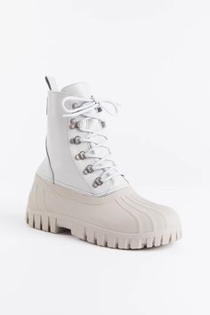 Patrol Boot Ivory Leather - Stutterheim (USA) White Lug Sole Boots For Streetwear, Trendy White Boots With Rubber Sole, White Lace-up Boots With Rubber Sole, White Lace-up Boots With Round Toe, Sporty Lace-up Boots With Lug Sole, White High-top Combat Boots With Lug Sole, White Lace-up Leather Hiking Boots, Lace-up Waterproof Boots With Lug Sole For Streetwear, White Leather Waterproof Boots For Winter