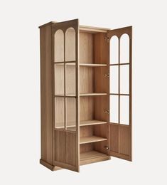 an open bookcase with shelves and doors on the front, in light brown wood