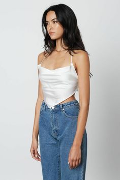 Final Sale-Get it before it's gone! You're going to look amazing in the Not So Basic White Satin Cowl Neck Halter Crop Top! Sleek white woven satin shapes a cowl neck halter neckline and a handkerchief cropped bodice with tie back. Style this bandana with distressed jeans for a cute casual look! DETAILS & CARE Polyester/Spandex. Machine wash cold. Imported. Casual Cropped Halter Top, White Satin Top, Handkerchief Top, Bandana Top, Boho Pink, Cowl Neck Top, Bathing Suit Top, Halter Crop Top, Satin Top