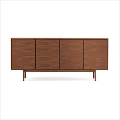 the sideboard is made from wood and has three doors