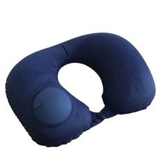 the neck pillow is blue and has a black button on it's back end