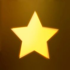 a yellow star is shining in the dark