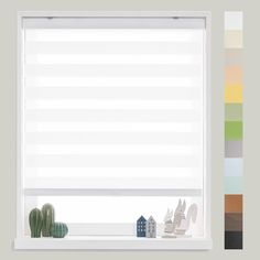 a window with white blinds in front of it and cactuses on the windowsill