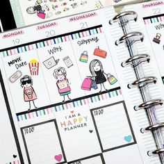 an open planner with stickers on it