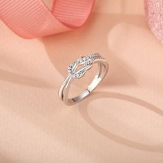 This unique knot promise ring is not only a beautiful piece of jewelry, but also a perfect symbol of love. The delicate lines of the metal are skillfully woven to form a knot that will never come undone, just like your closely connected hearts. Wearing this knot promise ring is like carrying your love vows with you at all times. It can be a token of your love or a precious gift to commemorate a special occasion. The simple yet elegant design makes it suitable for everyday wear to feel the warmth of love at all times. Choose this simple promise ring and let your love be as tightly connected as this delicate knot, never to be separated.Material: 925 SilverPlating Color: Silver Cheap Promise Rings For Her, Cute Promise Rings Girlfriends, Unique Promise Rings For Her, Promise Ring For Girlfriend, Promise Rings Silver, Knot Promise Ring, Simple Promise Ring, Dream Bored, Cheap Promise Rings