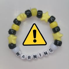 Ghost Kandi Bracelet, Things To Put On A Bracelet, Kandi South Park, Clay Bead Bracelet Ideas Emo, Candy Bead Bracelet Ideas, Bracelet Ideas Letters, Character Bracelet Ideas, Band Kandi Bracelets, Pony Beads Bracelet Ideas