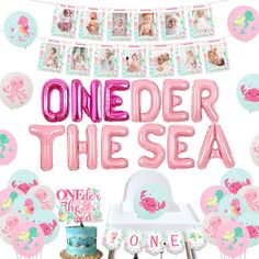 an under the sea birthday party with pink and blue decorations, balloons, and other items