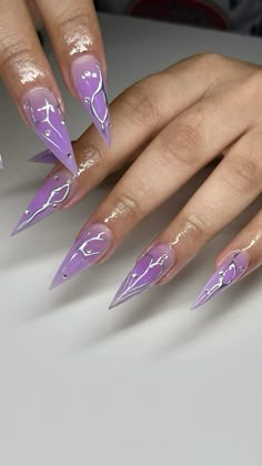 #fyp #nails #nailsofinstagram #acrylic #acrylicnaildesigns Lavender Y2k Nails, Stiletto Nails Idea, Purple Theme Nails, Royal Purple Nails Design, Lavender Stiletto Nails, New Years Nails 2025, Purple And Silver Nails Acrylic, Purple Nails Stiletto, Purple Stiletto Nails Design