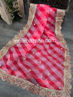 Lightweight organza leheriya dupatta with gold sequins work! Festive Red Shawl For Party, Festive Red Party Shawl, Red Bollywood Organza Dupatta, Red Bollywood Style Organza Dupatta, Red Unstitched Organza Dupatta, Red Organza Dupatta With Cutdana, Red Organza Dupatta With Zari Work, Red Organza Traditional Wear With Sheer Dupatta, Red Organza Dupatta For Festivals