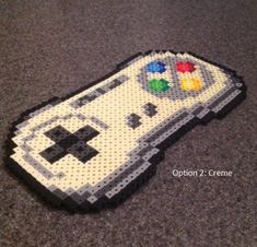 a close up of a game controller made out of legos