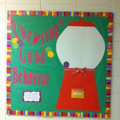 a bulletin board with a gummy machine on it that says, every good behavior