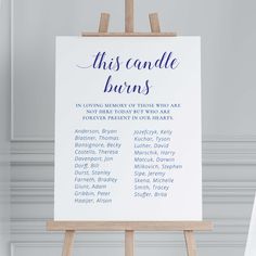 an easel with a sign that says, this candle burns in loving memory of those who are loved