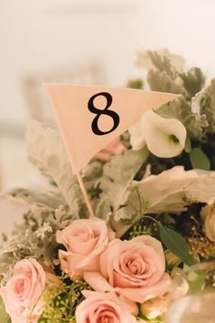 a table with flowers and a flag on it