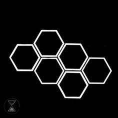 hexagons are arranged in the shape of honeycombs on a black background