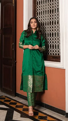 Bring on the festive spirit with our kurta set in pure woven chanderi silk.nWoven Jodhpuri style kurta with matching woven narrow straight pants.nKurta and Pants Fabric : Woven Chanderi Silk.nColour : Dark Green.nModel height is 5.4” and is wearing a size S.nWash Care : Dry Clean Only.nThis product will be exclusively handcrafted for you, making the colour/texture/pattern slightly vary from the image shown, due to multiple artisan-led techniques and processes involved. – Ethereal Outfitters Pattu Kurta Sets For Women, Good Earth Kurta Designs, Kurti Pair, Kaftan Kurta Set, Party Wear Dress Ideas For Women, Silk Ikat Kurta Designs, Kurti Design From Saree, Straight Salwar, Chanderi Saree Blouse Design