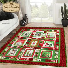 a living room with a christmas themed rug on the floor and potted plant next to it