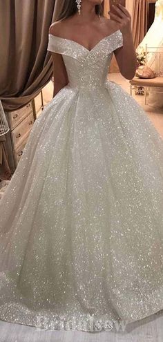 White A-line Ball Gown For Wedding, A-line Wedding Dress With Sequins, Sequined A-line Wedding Dress, A-line Embellished Wedding Gown, Sequin Wedding Dress With Fitted Bodice, Floor-length Sequined Wedding Dress For Debutante Ball, White Sequined Wedding Ball Gown, White Sequined Ball Gown For Wedding, Wedding Glitter Fitted Gown