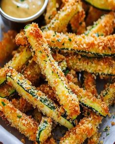 fried zucchini fries with dipping sauce on the side