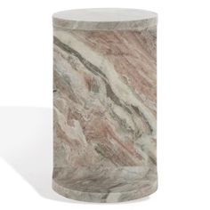 a marble vase sitting on top of a white table