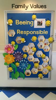 a bulletin board with bees and flowers on it