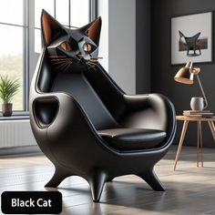 a black cat sitting on top of a chair