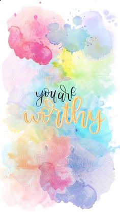 the words you are worthy written in gold on a colorful background with watercolor stains