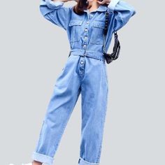 Slay the streets in style with our 2023 Spring Women's Denim Overall! This statement piece is sure to turn heads with its eye-catching free fit and buttoned closure. Get ready to make a statement with its stunning color palette and streetwear style flair.Why It's the Epitome of City ChicThis is one denim overall that's anything but ordinary. With its loose silhouette and bright colors. this overall is the perfect way to up your edgy style game.Features That Make It Pop: Denim Dominance: Nothing Spring Utility Denim Blue Jumpsuits And Rompers, Denim Blue Utility Jumpsuits And Rompers For Spring, Casual Blue Overalls With Buttons, Blue Button-up Overalls For Spring, Blue Utility Denim Jumpsuit For Spring, Spring Blue Denim Jumpsuit With Buttons, Blue Denim Jumpsuit With Buttons For Spring, Utility Blue Denim Jumpsuit For Spring, Trendy Button Closure Overalls Jumpsuit