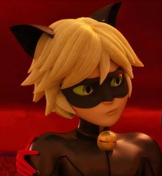 the animated catwoman is dressed in black and yellow, with horns on her head