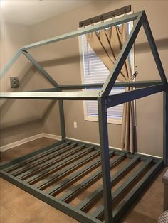 the bed frame is made out of metal and has no sheets on top of it