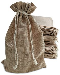 burlap bag with draws and cloths on white background