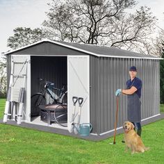 a man standing in front of a shed with his dog