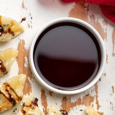 some food and a cup of coffee on a table