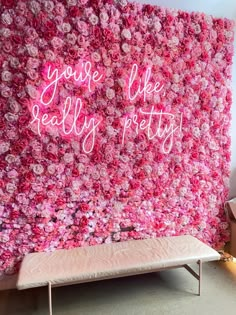 a pink flowered wall with the words you're like really pretty on it