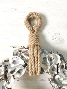 a rope that is attached to some shells