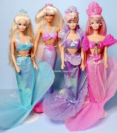 three barbie dolls are standing next to each other in mermaid outfits and underskirts