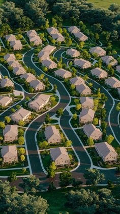 an aerial view of houses and roads in the suburbs