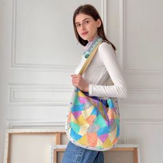 This bag is ideal for those who love bold, artistic accessories that stand out and bring a splash of colour to their outfit. Whether for casual outings, shopping trips, or as a unique gift, this patchwork shoulder bag combines functionality with creative design.  Lining - Yes Pocket - Yes Thickness -Medium Cover: Cotton 100% Digitally Printed Lining : Cotton 100%   Cold Wash (Machine washable) Casual Multicolor Hobo Bag For Shopping, Multicolor Reversible Rectangular Shoulder Bag, Large Capacity Multicolor Canvas Shoulder Bag, Multicolor Bohemian Bucket Bag For Shopping, Multicolor Tote Bucket Bag, Trendy Multicolor Hobo Bag Tote, Trendy Multicolor Hobo Tote Bag, Multicolor Canvas Bag For Shopping, Casual Multicolor Canvas Shopping Bag