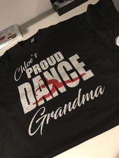 a t - shirt with the words proud dance grandma on it sitting on a counter