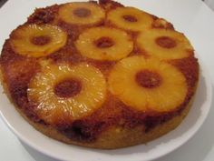 a pineapple upside down cake on a white plate