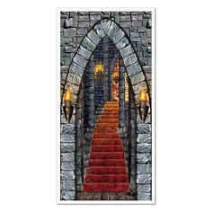 a stairway with red carpet leading up to an arched doorway that leads into another room