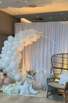 a room with balloons and decorations on the floor