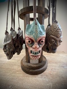 A single (1)  beautifully handcrafted miniature tiki mask  pendent necklace with leather strap. A perfect unique gift for yourself or the the Tiki lover, Adventurer,  Gothic, Fantasy or Horror fan.  Each Tiki Mask pendent necklace is made of  resin. Hand painted details and stands at 4.5 inches tall. Tiki Necklace, Tiki Sculptures & Statues, Tiki Mask, Pendent Necklace, Art Object, Sculpture Art, Leather Straps, Selling On Etsy, Sell On Etsy