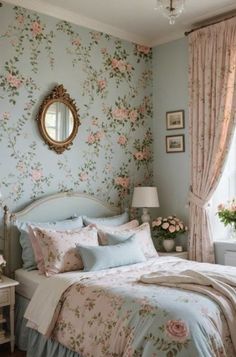 a bed sitting in a bedroom next to a window with flowers on the wall behind it