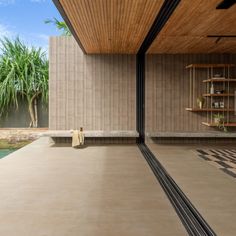 the inside of a house with an outdoor pool