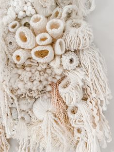 a pile of white yarn sitting on top of a table