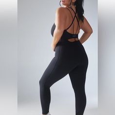 Savage X Fenty Curve Alert Jumpsuit / Bodysuit - New With Tags Size: Women's Xs / 0-2 Color: Caviar Black All About That Silhouette! Our Curve Alert Jumpsuit Features A Built-In Shelf Bra, A Smoothing Panel For A Snatched Look, Adjustable Crisscross Back Straps, A Back Keyhole Cutout, And Flat-Lock Stitching That Moves With Your Body. Full Length 26" Inseam Built-In Shelf Bra Tummy Control Front Panel Crisscross Back Straps Keyhole Cutout At Lower Back Princess Seaming Detail Along Bodice And Le Hoodie Jumpsuit, Leopard Jumpsuit, Athleisure Leggings, Savage X Fenty, White Halter Maxi Dress, Sleeveless Jumpsuits, Shelf Bra, Wide Leg Jumpsuit