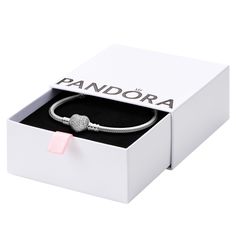 PRICES MAY VARY. Snake Chain Heart Bracelet: Set your heart a-flutter with this romantic PANDORA charm bracelet; pair it with other PANDORA bracelets for a multi-layered look Compatible with PANDORA Moments: PANDORA Moments is a way to say something about who you are through every charm and bracelet you choose and how you choose to wear it Features CZ: Cubic zirconia could be said to be the jewel in PANDORA's crown, making up the majority of stones we use in our jewelry because it optically look Crown Making, Pandora Collection, Real Christmas, Chain Heart, Sterling Silver Charm Bracelet, Snake Chain Bracelets, Gold Charm Bracelet, Pandora Charm, Silver Charm Bracelet