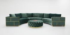 a green sectional couch sitting on top of a white floor next to a foot stool